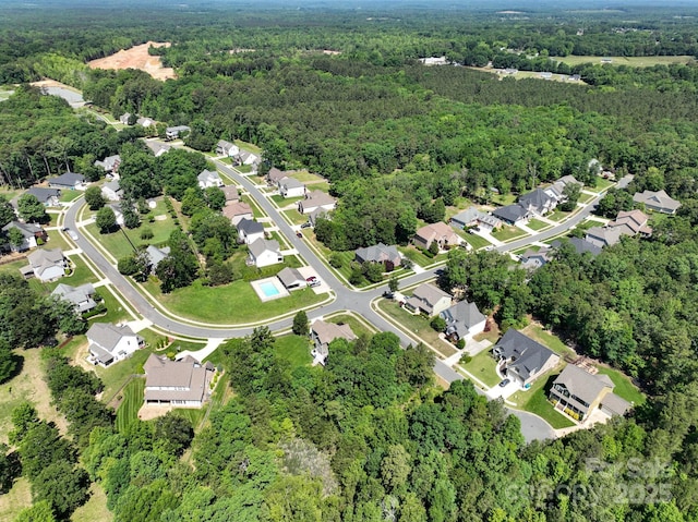 201 Vanderbilt Blvd, Locust, NC 28097 - aerial overview of property's location featuring a forest and nearby suburban area