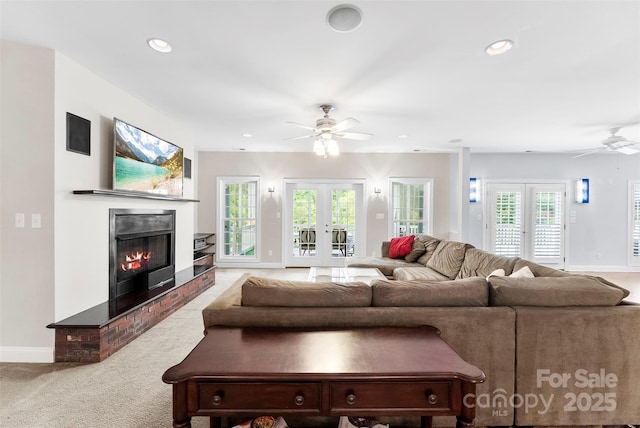 5418 Commodore Pl, Clover, SC 29710 - living room with ceiling fan, a glass covered fireplace, french doors, recessed lighting, and carpet