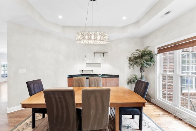 5418 Commodore Pl, Clover, SC 29710 - dining room featuring light wood finished floors, baseboards, and a chandelier