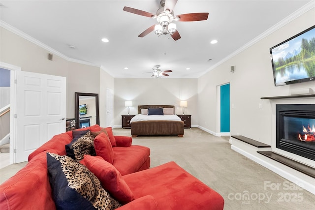 5418 Commodore Pl, Clover, SC 29710 - bedroom with light carpet, recessed lighting, a glass covered fireplace, baseboards, and ornamental molding