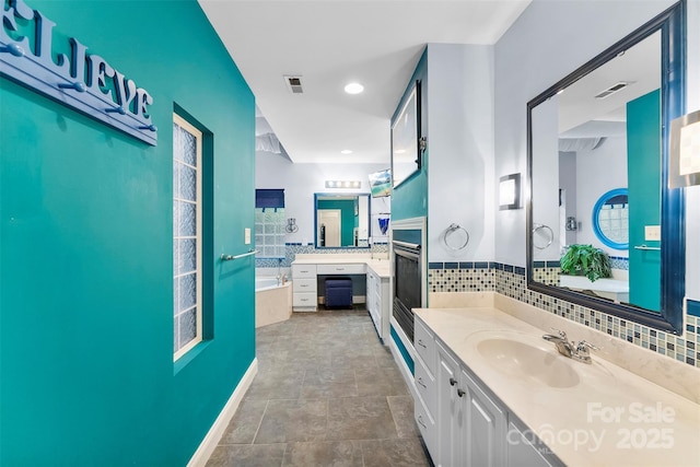 5418 Commodore Pl, Clover, SC 29710 - full bath with a bath, two vanities, and tasteful backsplash