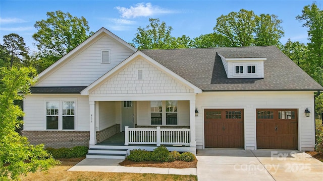 4116 Spring Cove Way, Belmont, NC 28012 - view of front facade with a porch, concrete driveway, an attached garage, and a shingled roof