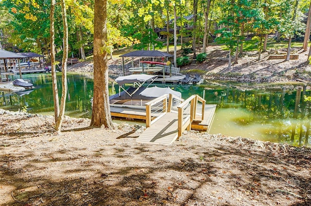 4116 Spring Cove Way, Belmont, NC 28012 - dock with a water view, boat lift, and view of scattered trees