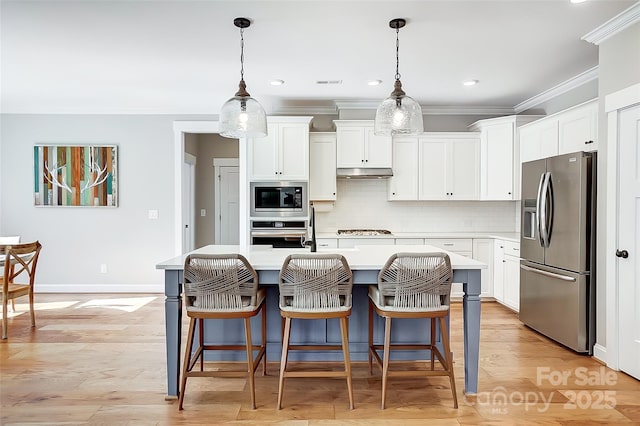 4116 Spring Cove Way, Belmont, NC 28012 - kitchen featuring stainless steel appliances, under cabinet range hood, crown molding, light countertops, and tasteful backsplash