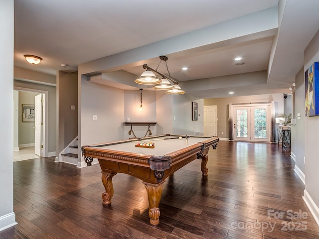 game room with baseboards, hardwood / wood-style flooring, billiards table, a tray ceiling, and recessed lighting