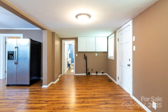 205 Stowe Acres Rd, Kings Mountain, NC 28086 - laundry area with wood finished floors, baseboards, and crown molding