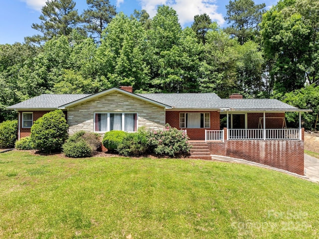 24501 Canton Rd, Albemarle, NC 28001 - ranch-style house featuring a chimney, a porch, and a front yard
