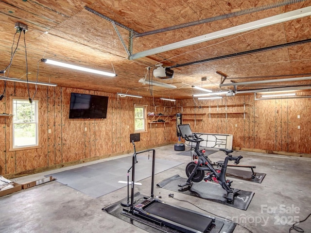 4111 Jenkins Rd, Marshville, NC 28103 - workout area featuring a garage and wooden walls