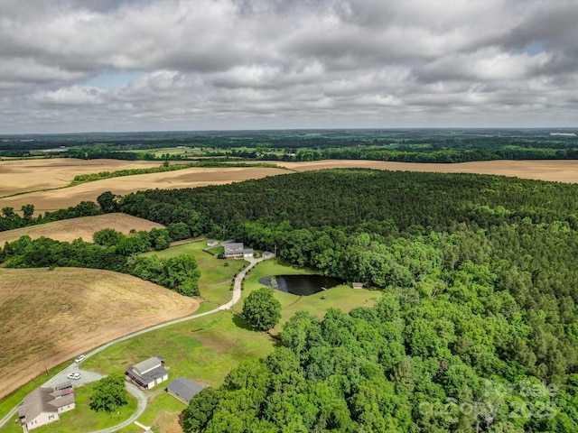 4111 Jenkins Rd, Marshville, NC 28103 - drone / aerial view of a heavily wooded area and a nearby body of water