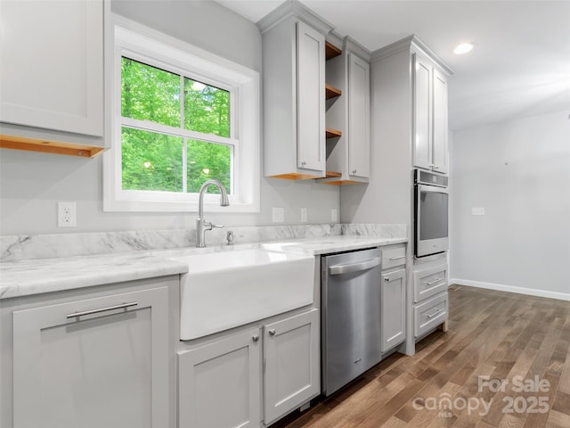 155 Pebble Ridge Rd, Spruce Pine, NC 28777 - kitchen featuring stainless steel appliances, a sink, open shelves, wood finished floors, and baseboards