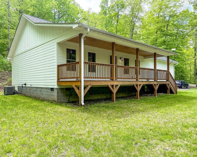 155 Pebble Ridge Rd, Spruce Pine, NC 28777 - view of front of property with a front lawn, central AC unit, crawl space, a porch, and board and batten siding