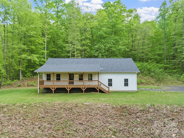 155 Pebble Ridge Rd, Spruce Pine, NC 28777 - view of front of home with a front yard and a wooded view