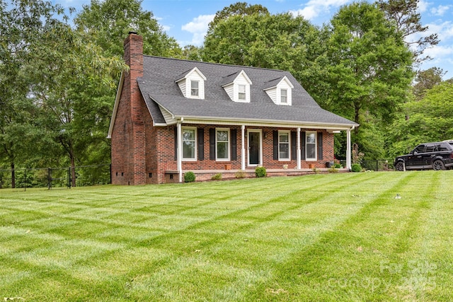 3049 Stablegate Dr, Gastonia, NC 28052 - cape cod home with brick siding, covered porch, and a chimney