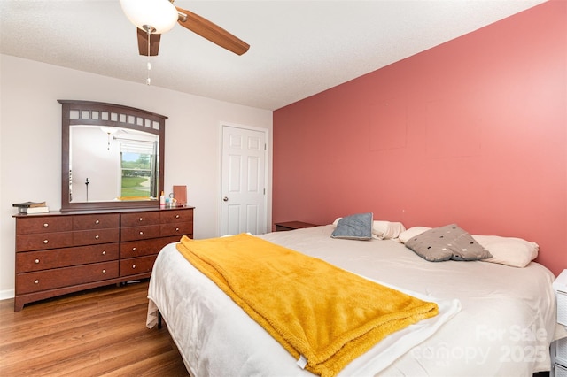 3049 Stablegate Dr, Gastonia, NC 28052 - bedroom featuring wood finished floors and a ceiling fan