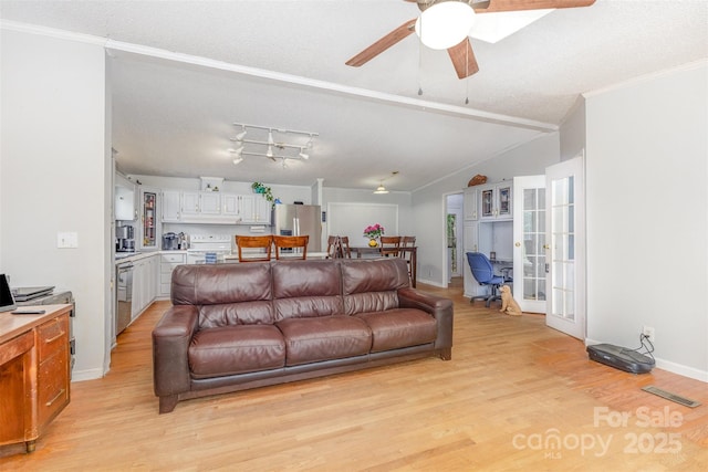 403 Carpenter Parker Ln, Rock Hill, SC 29730 - living area featuring light wood-style flooring, a ceiling fan, an office area, ornamental molding, and baseboards