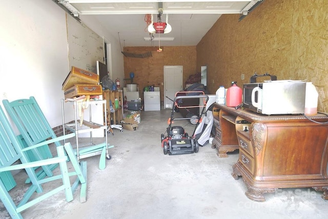 305 Ridge Manor Dr, Raeford Township, NC 28376 - garage with a garage door opener and separate washer and dryer