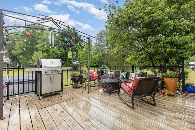 2906 Chapman Cir, Rock Hill, SC 29732 - wooden terrace with area for grilling and an outdoor living space with a fire pit
