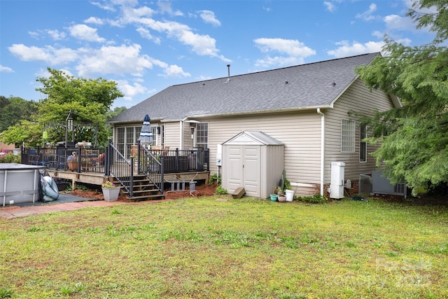 2906 Chapman Cir, Rock Hill, SC 29732 - back of house featuring a storage shed, a deck, a yard, and an outbuilding