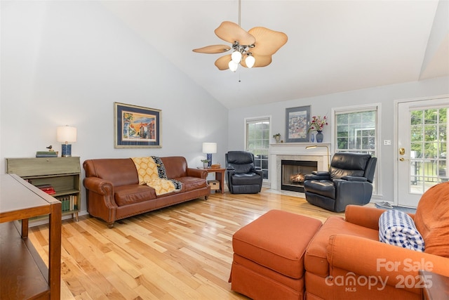 2906 Chapman Cir, Rock Hill, SC 29732 - living area with light wood-style flooring, high vaulted ceiling, a fireplace with flush hearth, and ceiling fan