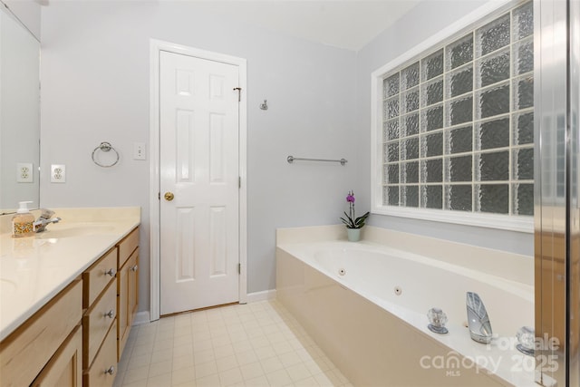 2906 Chapman Cir, Rock Hill, SC 29732 - bathroom with vanity, a tub with jets, and tile patterned flooring