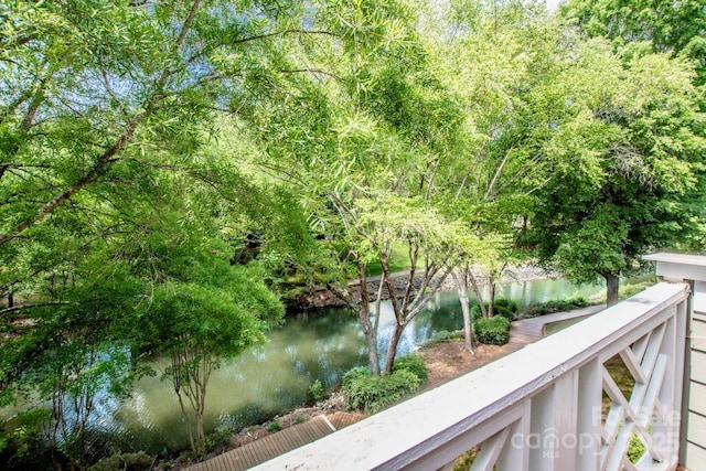 balcony featuring a water view