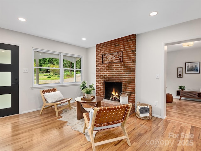 16 Emerson Poore Dr, Candler, NC 28715 - living room with wood finished floors, a fireplace, baseboards, and recessed lighting