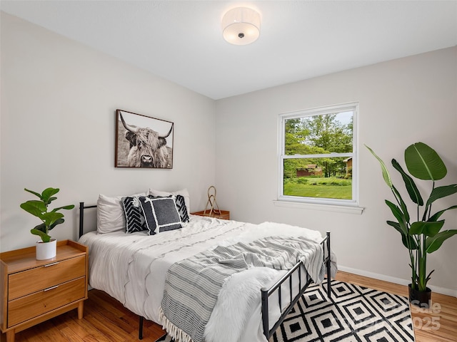 16 Emerson Poore Dr, Candler, NC 28715 - bedroom with wood finished floors and baseboards