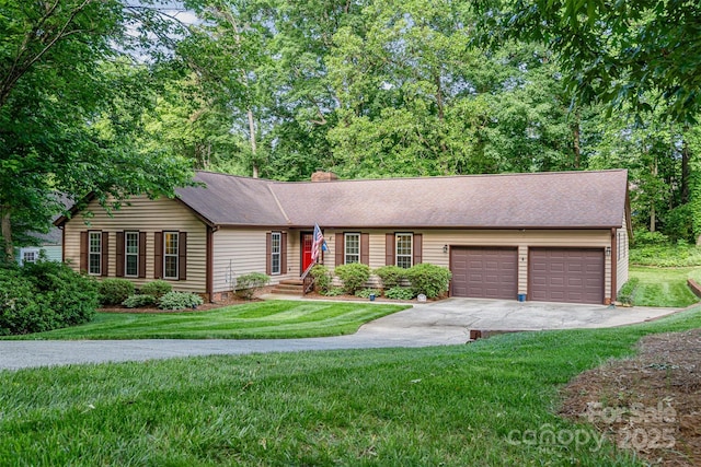 ranch-style house featuring an attached garage, concrete driveway, a front yard, a chimney, and a shingled roof