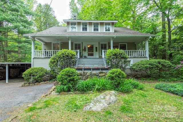 223 Assembly Dr, Montreat, NC 28757 - view of front of home with a porch, a carport, driveway, and a shingled roof