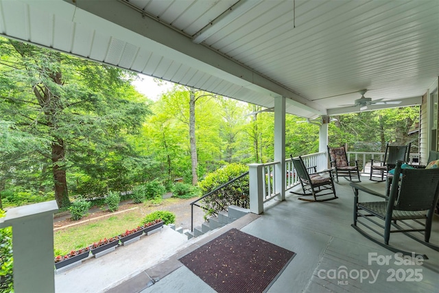 223 Assembly Dr, Montreat, NC 28757 - view of patio with ceiling fan, a porch, and a wooded view