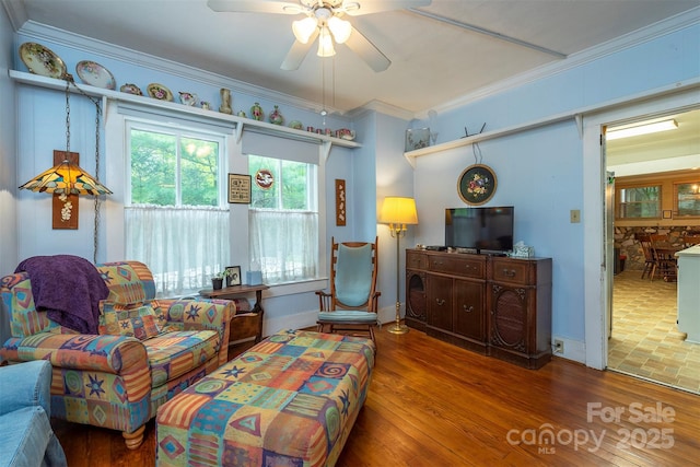 223 Assembly Dr, Montreat, NC 28757 - sitting room featuring ceiling fan, ornamental molding, wood finished floors, and baseboards