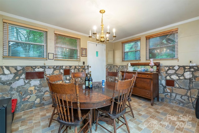 223 Assembly Dr, Montreat, NC 28757 - dining area featuring a chandelier, crown molding, and light stone finish flooring