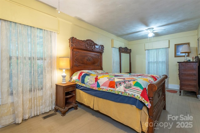 223 Assembly Dr, Montreat, NC 28757 - bedroom featuring wood finished floors and a ceiling fan