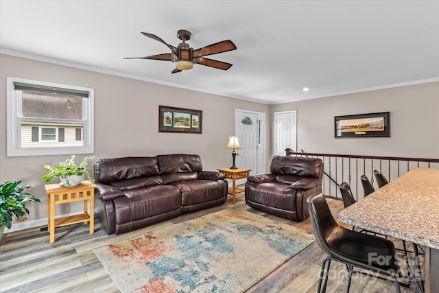 147 Bluewing Ln Unit 274, Mooresville, NC 28117 - living area with wood finished floors, ceiling fan, crown molding, and baseboards
