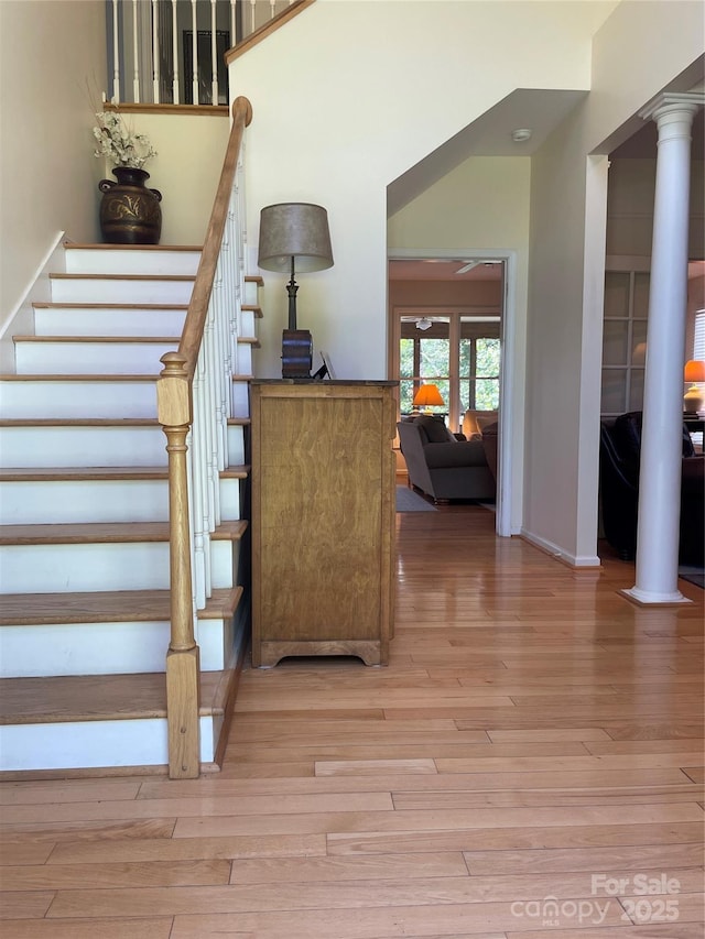 357 Lentz Landing Ln, Nebo, NC 28761 - staircase featuring hardwood / wood-style flooring and decorative columns