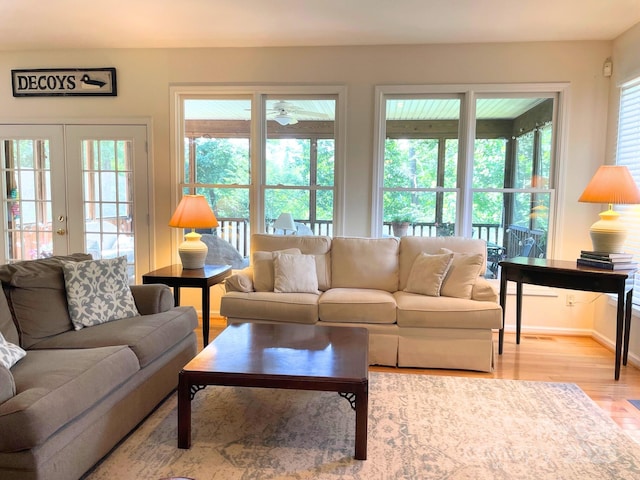 357 Lentz Landing Ln, Nebo, NC 28761 - living room featuring light wood-type flooring, french doors, and a ceiling fan