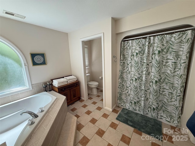 357 Lentz Landing Ln, Nebo, NC 28761 - bathroom with a garden tub and a shower with curtain