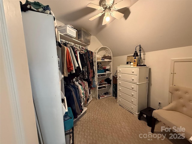 357 Lentz Landing Ln, Nebo, NC 28761 - walk in closet with carpet floors, ceiling fan, and vaulted ceiling
