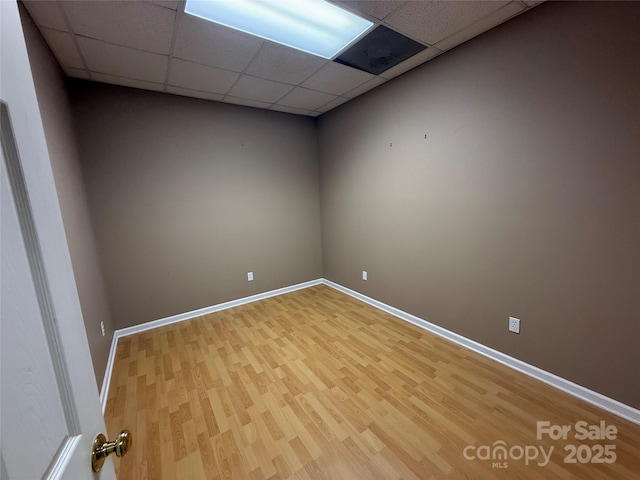 357 Lentz Landing Ln, Nebo, NC 28761 - unfurnished room with light wood-style floors and a paneled ceiling