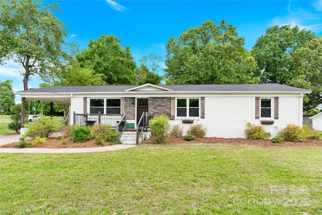 1501 E Church St, Cherryville, NC 28021 - single story home featuring brick siding, a front lawn, a carport, and covered porch
