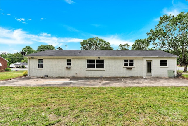 1501 E Church St, Cherryville, NC 28021 - rear view of property featuring a patio, a lawn, and brick siding