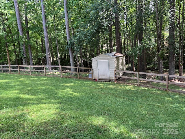 view of yard with a shed and an outdoor structure