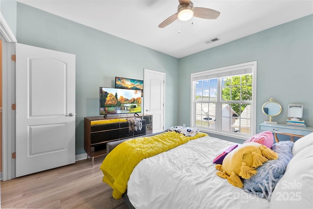 2485 Shanklin Ln, Denver, NC 28037 - bedroom with wood finished floors and ceiling fan