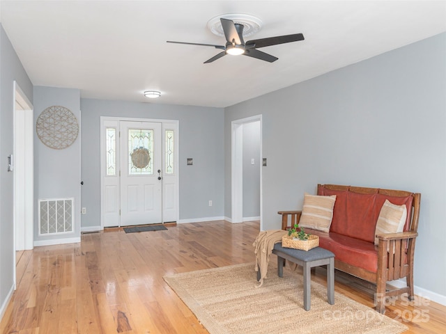 2600 Crabtree Rd, Waynesville, NC 28785 - foyer entrance featuring a ceiling fan, baseboards, and light wood-style flooring