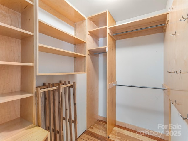 2600 Crabtree Rd, Waynesville, NC 28785 - spacious closet featuring wood finished floors