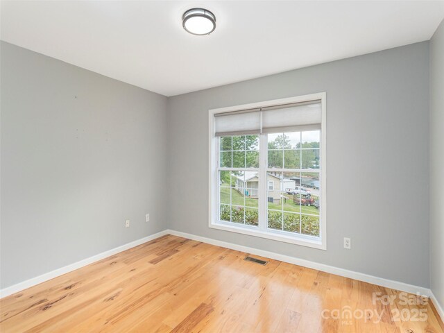 2600 Crabtree Rd, Waynesville, NC 28785 - empty room with baseboards and wood finished floors