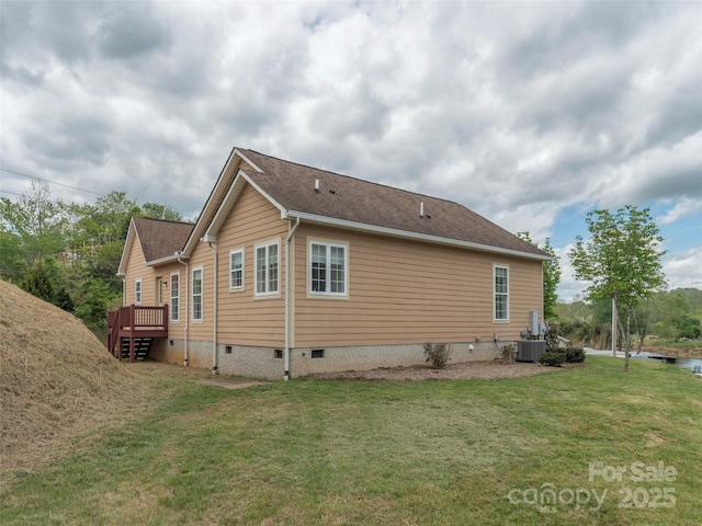 2600 Crabtree Rd, Waynesville, NC 28785 - view of home's exterior featuring crawl space, a lawn, central air condition unit, and a wooden deck