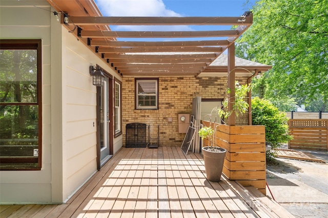 wooden deck featuring fence
