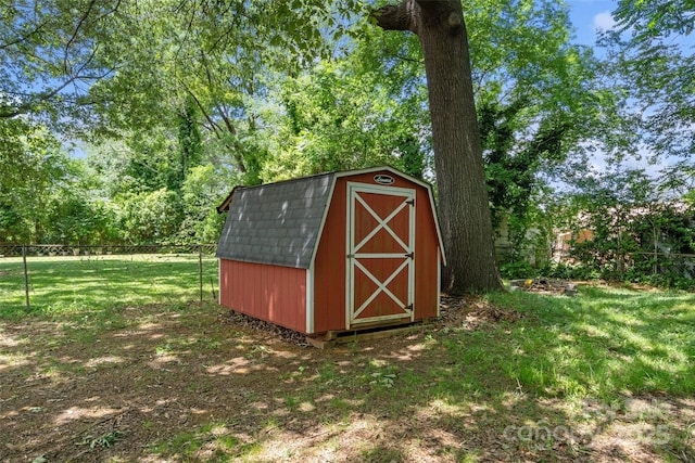 view of shed featuring view of scattered trees