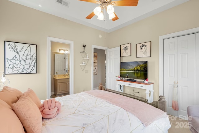 143 Wildflower Ln, Sugar Mountain, NC 28604 - bedroom featuring a closet, ensuite bathroom, and a ceiling fan